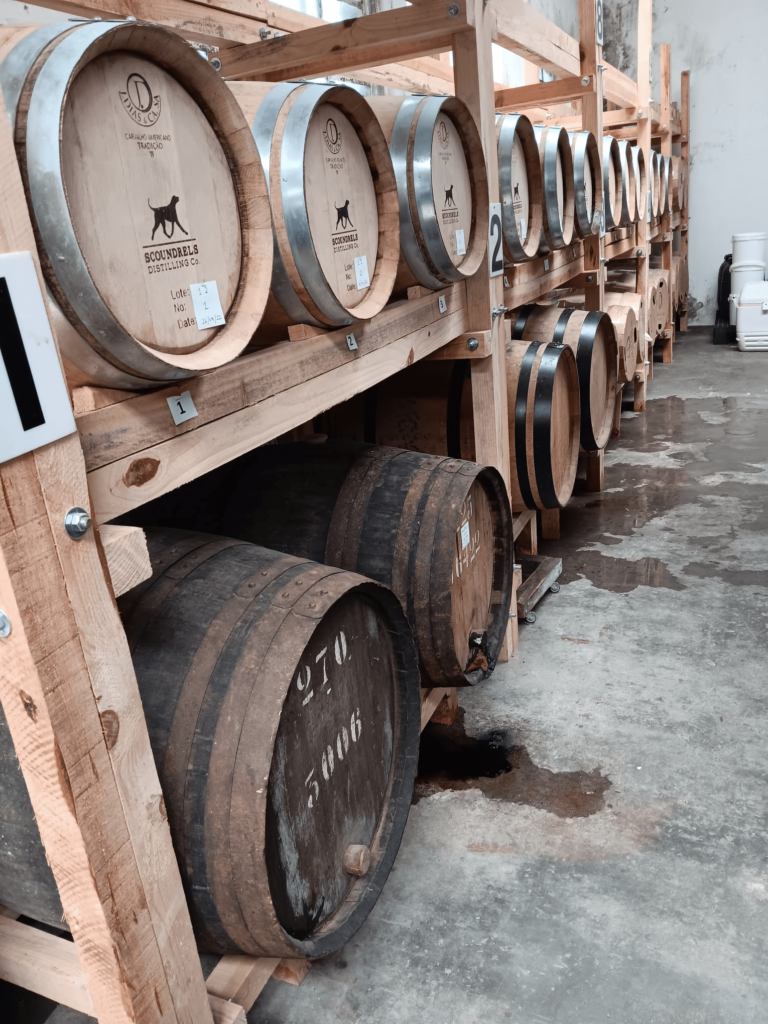 A rack of Port Barrels storing Rum in Scoundrels Distillery in Porto